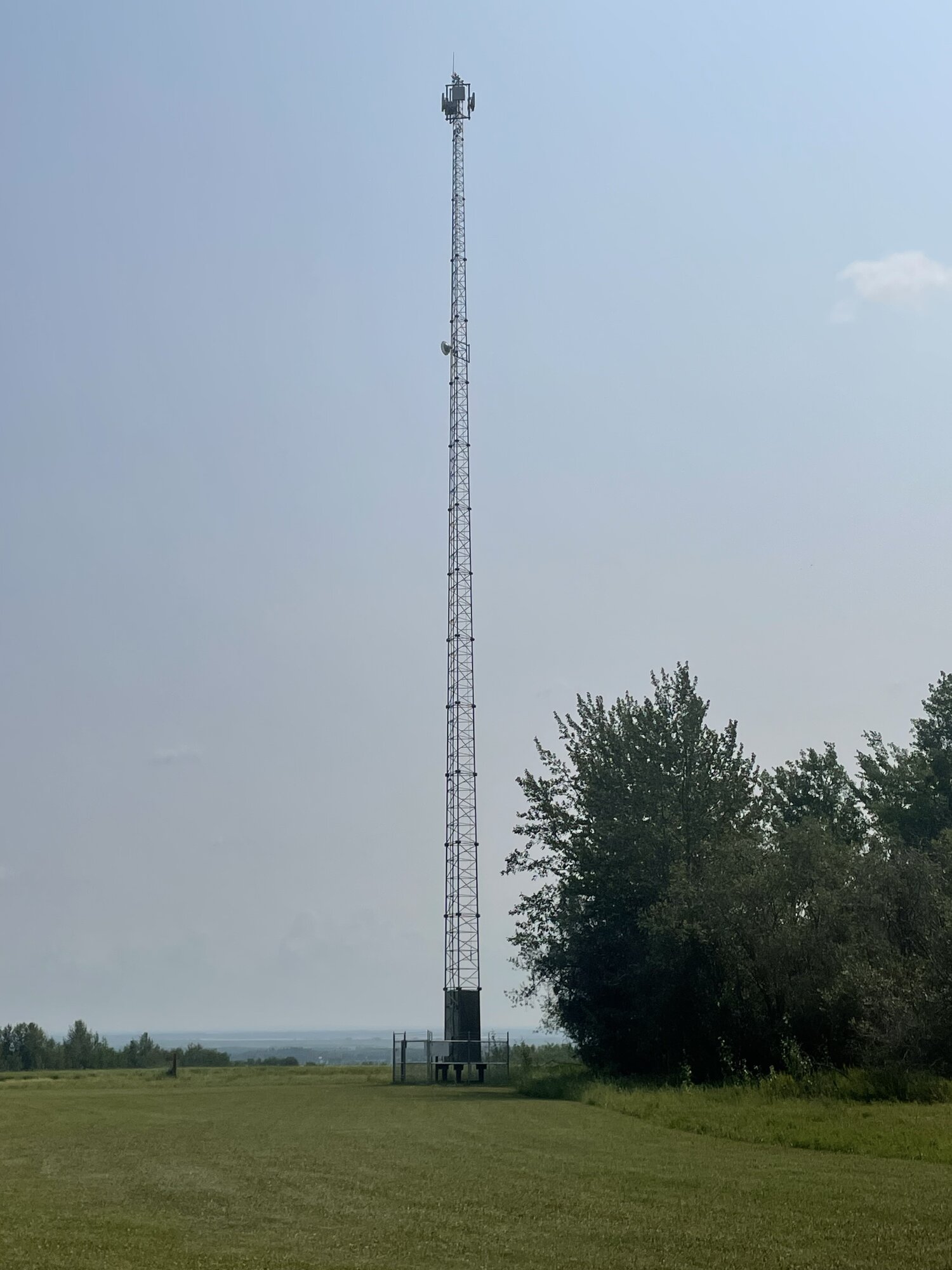 Arrow Technology Group narrow lattice tower in rural Alberta